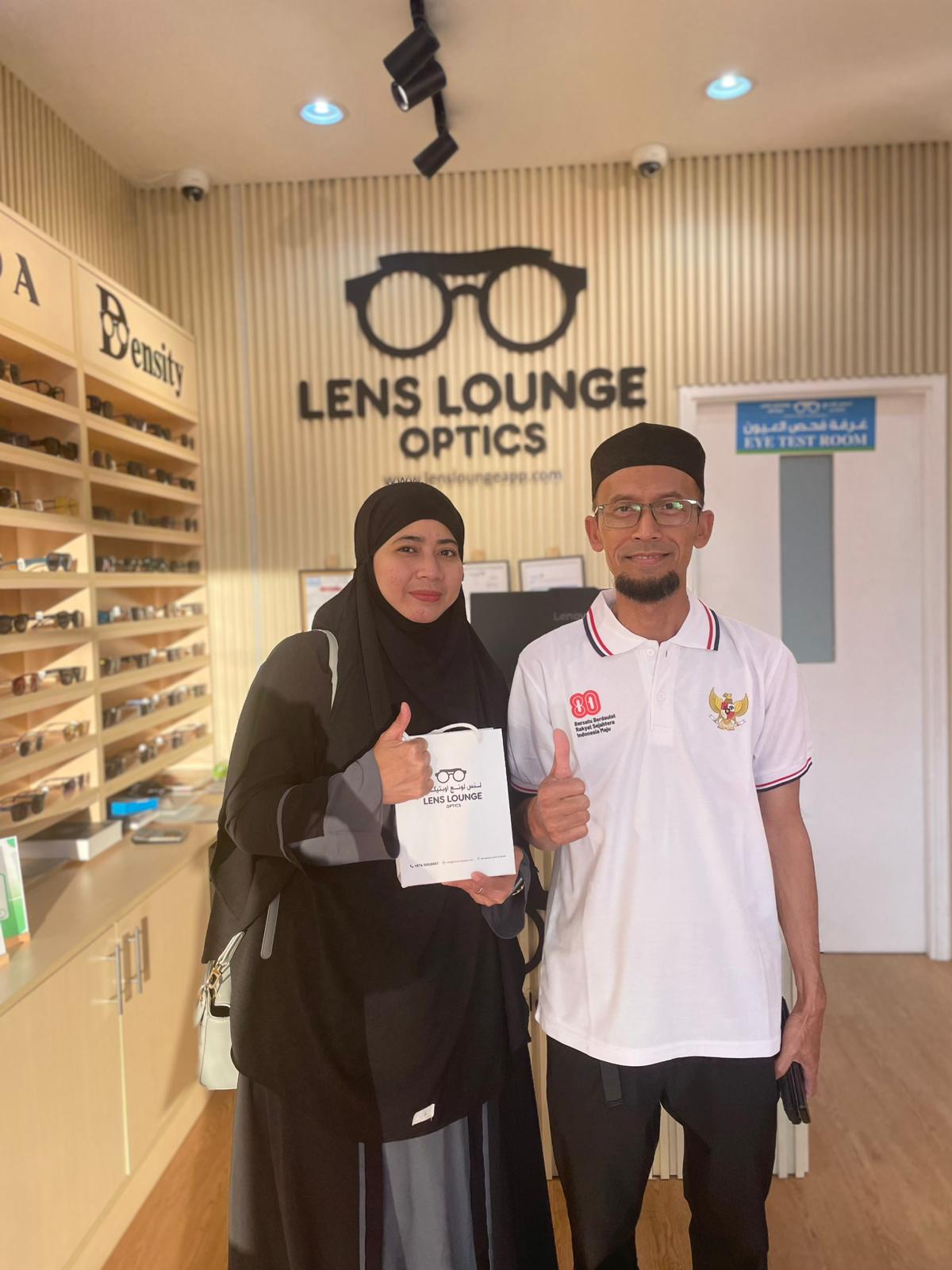 Customer wearing luxury frames in Lens Lounge